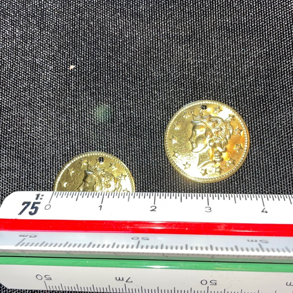 Large metal coin embellishment